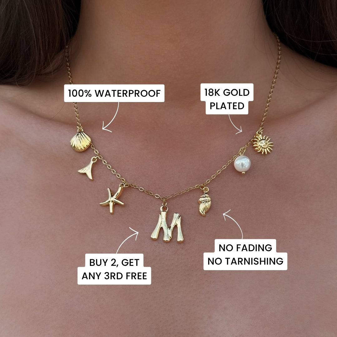 Gold ocean letter necklace