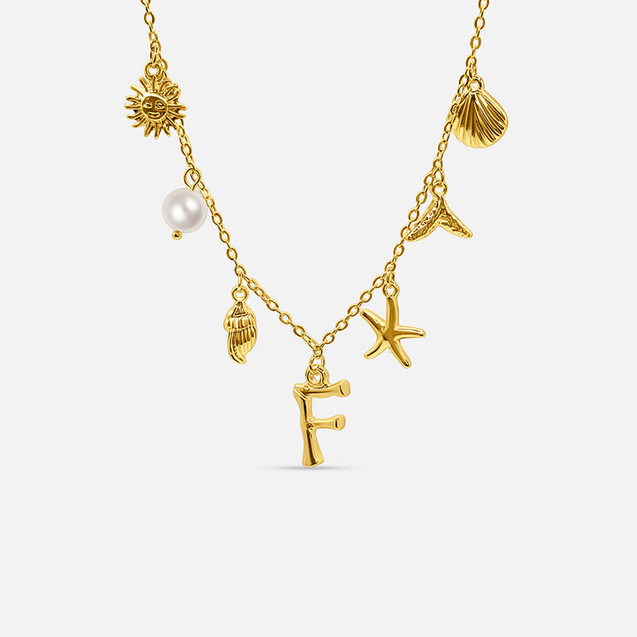 Gold ocean letter necklace