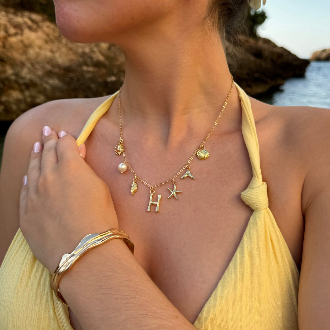 Gold ocean letter necklace