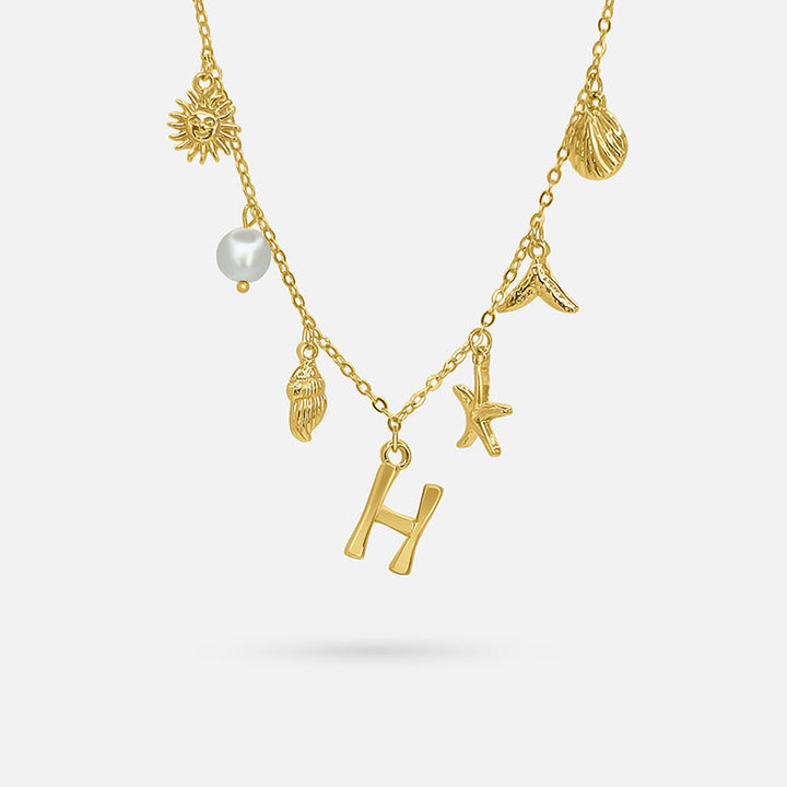 Gold ocean letter necklace