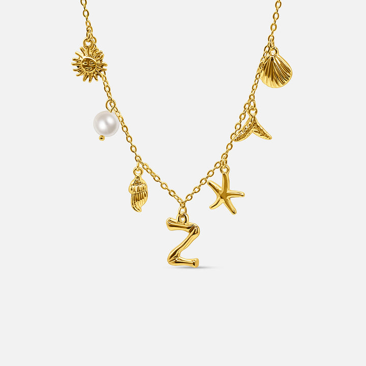 Gold ocean letter necklace